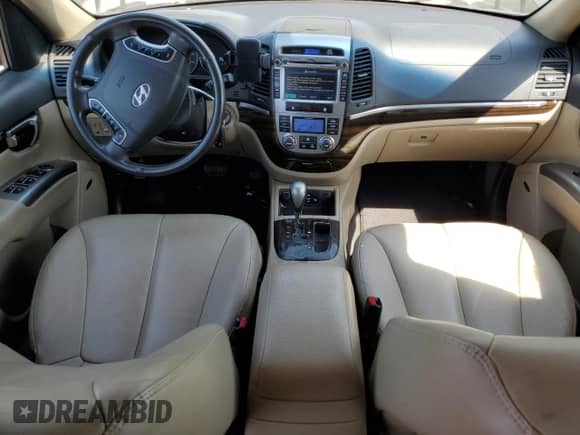 2012 Hyundai Santa Fe Limited с VIN 5XYZK4AG6CG103717, выставлен на аукционе Copart как лот 65180475 с пробегом 90 083 миль миль и Списание • Salvage title. История ставок и продаж доступна на DreamBid. Изображение 8.