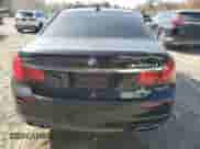 2013 BMW 7 Series with VIN WBAYG0C50DDZ04741, listed as a Copart auction lot 77791104 with 55,658 mi miles and Salvage title. Bid and sale history available at DreamBid. Image 6.