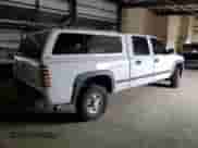 2001 Chevrolet Silverado 2500HD LS с VIN 1GCHC23UX1F106135, выставлен на аукционе Copart как лот 71551844 с пробегом 145 245 миль миль и Списание • Salvage title. История ставок и продаж доступна на DreamBid. Изображение 3.