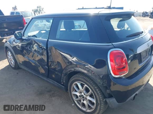 2014 MINI Hardtop with VIN WMWXM5C53ET934731, listed as a IAAI auction lot 43345367 with 48,628 mi miles and . Bid and sale history available at DreamBid. Image 6.