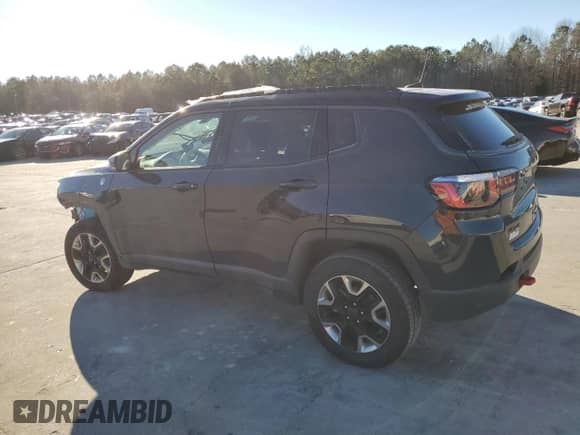 2017 Jeep Compass Trailhawk with VIN 3C4NJDDB3HT656830, listed as a Copart auction lot 86705404 with 50,753 mi miles and Salvage title. Bid and sale history available at DreamBid. Image 2.