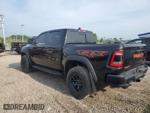 2021 Ram 1500 TRX с VIN 1C6SRFU99MN758770, выставлен на аукционе Copart как лот 64542315 с пробегом 59 155 миль миль и Списание • Salvage title. История ставок и продаж доступна на DreamBid. Изображение 2.