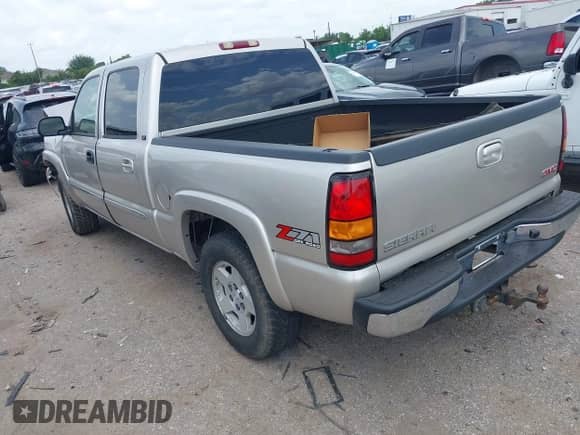 2005 GMC Sierra 1500 SLE with VIN 2GTEK13T251149615, listed as a IAAI auction lot 42646721 with 155,349 mi miles and . Bid and sale history available at DreamBid. Image 3.