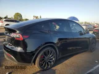 2022 Tesla Model Y Performance with VIN 7SAYGDEF9NF393852, listed as a Copart auction lot 63141094 with 26,972 mi miles and Salvage title. Bid and sale history available at DreamBid. Image 3.