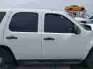 2013 Chevrolet Tahoe Commercial with VIN 1GNLC2E0XDR253196, listed as a IAAI auction lot 42046330 with 156,135 mi miles and . Bid and sale history available at DreamBid. Image 14.