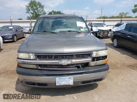 2002 Chevrolet Silverado 1500 LS z VIN 2GCEC19T921110469, wystawiony jako IAAI lot #39912012 z przebiegiem 288 705 mil mil oraz . Historia ofert i sprzedaży dostępna na DreamBid. Obrazek 13.