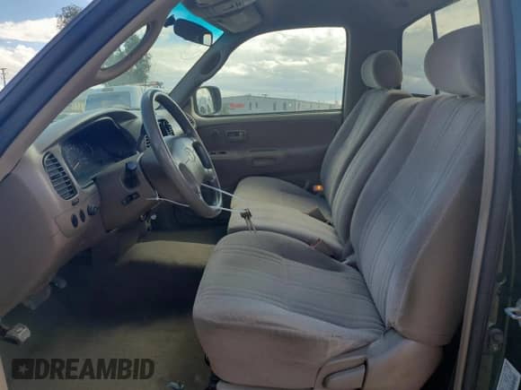 2000 Toyota Tundra SR5 with VIN 5TBKT4412YS057926, listed as a Copart auction lot 80147765 with 189,851 mi miles and Salvage title. Bid and sale history available at DreamBid. Image 7.