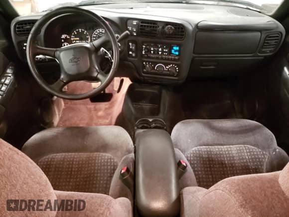 1999 Chevrolet Blazer LT z VIN 1GNDT13W4X2149645, wystawiony jako Copart lot #68597425 z przebiegiem 184 694 mil mil oraz Czysty tytuł • Clean title. Historia ofert i sprzedaży dostępna na DreamBid. Obrazek 8.