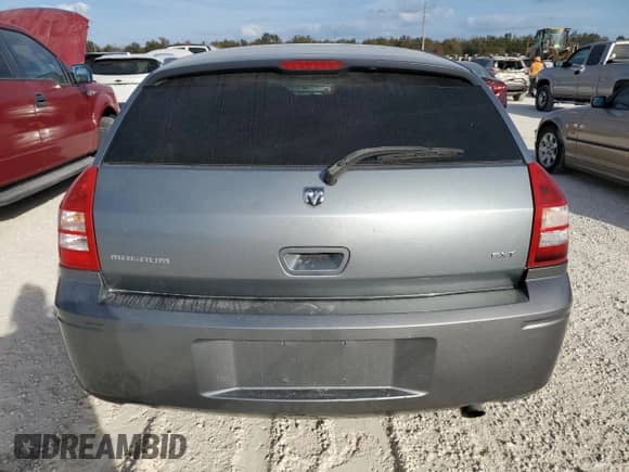 2006 Dodge Magnum with VIN 2D8FV47V46H148226, listed as a Copart auction lot 77026524 with 80,155 mi miles and Salvage title. Bid and sale history available at DreamBid. Image 6.