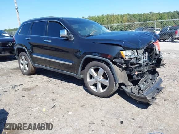 2012 Jeep Grand Cherokee Overland z VIN 1C4RJECT3CC240413, wystawiony jako IAAI lot #43189587 z przebiegiem 91 669 mil mil oraz . Historia ofert i sprzedaży dostępna na DreamBid. Obrazek 1.