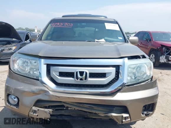 2009 Honda Pilot Touring with VIN 5FNYF38809B004142, listed as a IAAI auction lot 42337103 with 152,874 mi miles and . Bid and sale history available at DreamBid. Image 12.