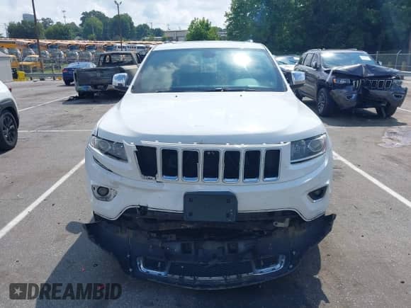 2014 Jeep Grand Cherokee Limited with VIN 1C4RJFBG4EC351033, listed as a IAAI auction lot 42870546 with 194,263 mi miles and . Bid and sale history available at DreamBid. Image 12.