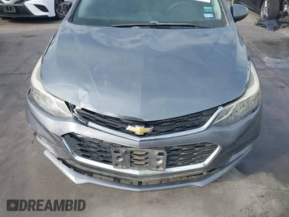 2018 Chevrolet Cruze LT z VIN 1G1BE5SM2J7188657, wystawiony jako IAAI lot #43440260 z przebiegiem 173 856 mil mil oraz . Historia ofert i sprzedaży dostępna na DreamBid. Obrazek 17.