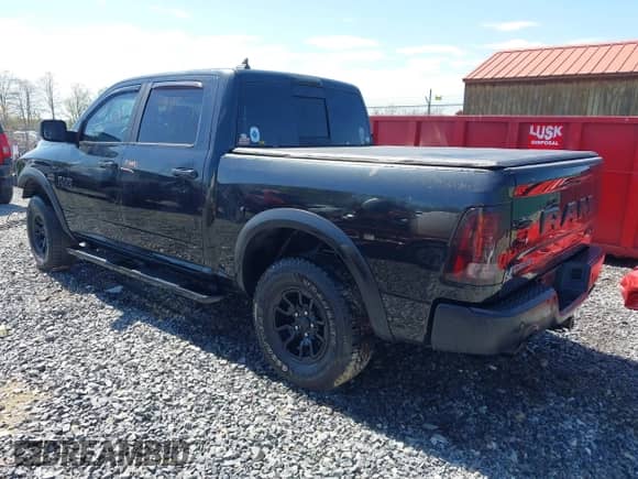 2018 Ram 1500 Rebel with VIN 1C6RR7YT4JS145768, listed as a IAAI auction lot 41593734 with 66,820 mi miles and . Bid and sale history available at DreamBid. Image 3.