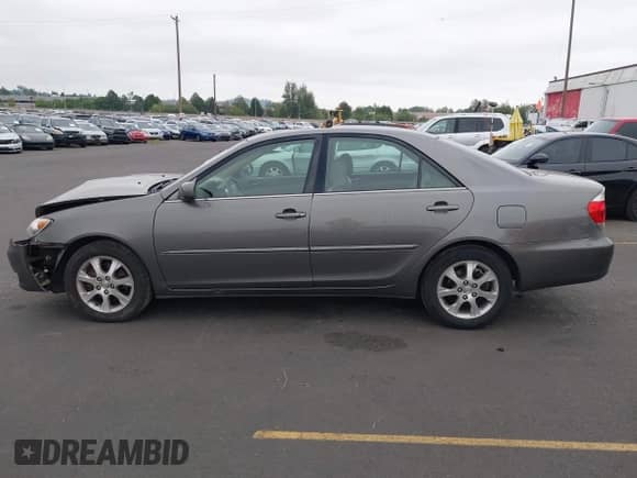 2005 Toyota Camry XLE с VIN 4T1BF30K55U593263, выставлен на аукционе IAAI как лот 43189841 с пробегом 90 753 миль миль и . История ставок и продаж доступна на DreamBid. Изображение 14.