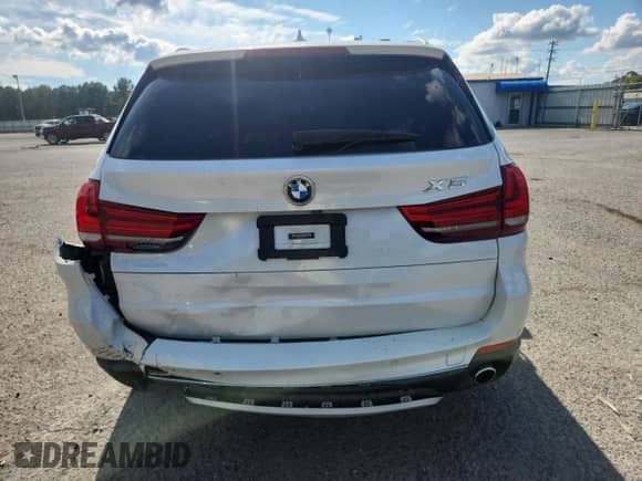 2017 BMW X5 xDrive35i with VIN 5UXKR0C37H0V71127, listed as a Copart auction lot 85703435 with 126,880 mi miles and Salvage title. Bid and sale history available at DreamBid. Image 6.