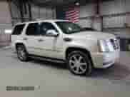 2009 Cadillac Escalade z VIN 1GYFK43569R209961, wystawiony jako Copart lot #54011705 z przebiegiem 143 894 mil mil oraz Czysty tytuł • Clean title. Historia ofert i sprzedaży dostępna na DreamBid. Obrazek 4.