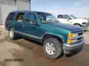 1998 Chevrolet Tahoe with VIN 1GNEK13R7WJ341633, listed as a Copart auction lot 62160905 with 304,284 mi miles and Salvage title. Bid and sale history available at DreamBid. Image 4.