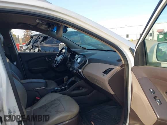 2014 Hyundai Tucson Limited with VIN KM8JU3AG6EU879652, listed as a IAAI auction lot 43390014 with 181,767 mi miles and . Bid and sale history available at DreamBid. Image 5.