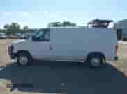 2014 Ford Econoline Cargo Commercial with VIN 1FTNE1EL7EDA59384, listed as a IAAI auction lot 43391909 with 306,342 mi miles and . Bid and sale history available at DreamBid. Image 13.