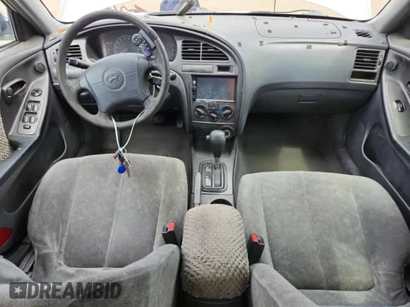 2003 Hyundai Elantra GLS с VIN KMHDN45D63U477319, выставлен на аукционе Copart как лот 71178145 с пробегом Не указан миль и Списание • Salvage title. История ставок и продаж доступна на DreamBid. Изображение 8.