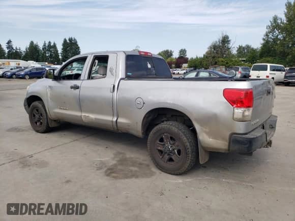 2010 Toyota Tundra with VIN 5TFUM5F10AX007848, listed as a Copart auction lot 66760365 with 322,064 mi miles and Salvage title. Bid and sale history available at DreamBid. Image 2.