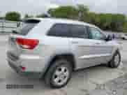 2011 Jeep Grand Cherokee Laredo с VIN 1J4RS4GG2BC548976, выставлен на аукционе Copart как лот 80756485 с пробегом 218 329 миль миль и Списание • Salvage title. История ставок и продаж доступна на DreamBid. Изображение 3.