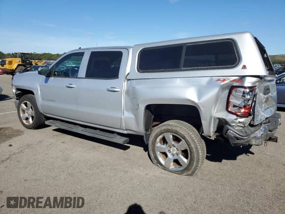 2014 Chevrolet Silverado 1500 LT with VIN 3GCUKREC1EG152276, listed as a Copart auction lot 83937285 with 105,532 mi miles and Salvage title. Bid and sale history available at DreamBid. Image 2.