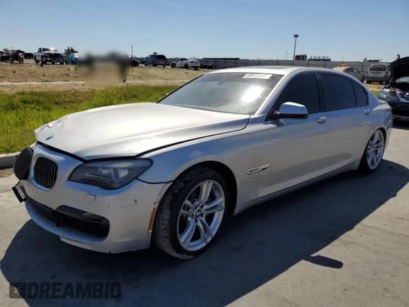 2012 BMW 7 Series 750Li с VIN WBAKB8C5XCC965182, выставлен на аукционе Copart как лот 68873985 с пробегом Не указан миль и Списание • Salvage title. История ставок и продаж доступна на DreamBid. Изображение 1.