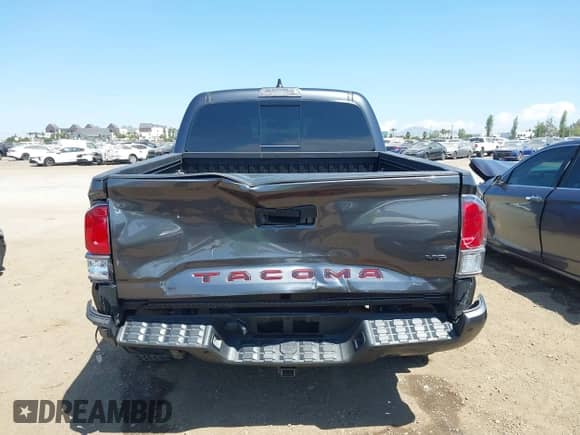 2021 Toyota Tacoma SR with VIN 3TMCZ5AN3MM450562, listed as a IAAI auction lot 43071461 with 15,850 mi miles and . Bid and sale history available at DreamBid. Image 16.