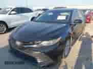 2018 Toyota Camry SE with VIN 4T1B11HK4JU658668, listed as a IAAI auction lot 43204847 with 195,921 mi miles and . Bid and sale history available at DreamBid. Image 2.