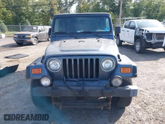 2001 Jeep Wrangler Sport z VIN 1J4FA49S01P329609, wystawiony jako IAAI lot #43091103 z przebiegiem 151 346 mil mil oraz . Historia ofert i sprzedaży dostępna na DreamBid. Obrazek 6.