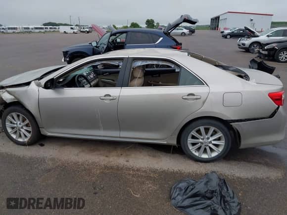2013 Toyota Camry LE with VIN 4T1BD1FK3DU083610, listed as a IAAI auction lot 42601184 with 94,250 mi miles and . Bid and sale history available at DreamBid. Image 14.
