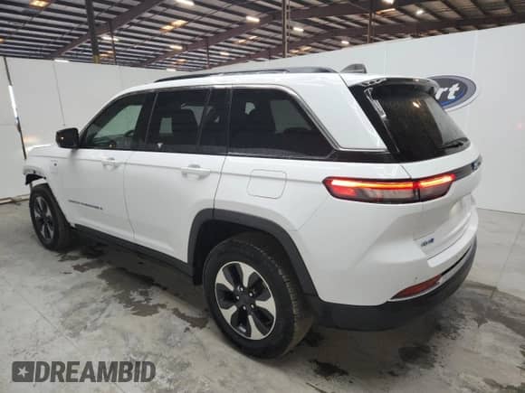 2024 Jeep Grand Cherokee with VIN 1C4RJYB69RC129743, listed as a Copart auction lot 87460235 with 56,990 mi miles and Clean title. Bid and sale history available at DreamBid. Image 2.