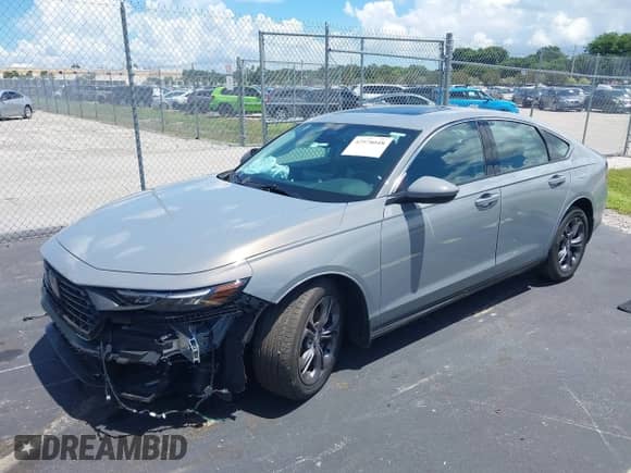 2025 Honda Accord EX-L with VIN 1HGCY2F66SA021933, listed as a IAAI auction lot 42978048 with 7,939 mi miles and . Bid and sale history available at DreamBid. Image 16.