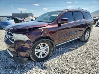 2012 Dodge Durango SXT with VIN 1C4RDJAGXCC147054, listed as a Copart auction lot 80577865 with 202,793 mi miles and Salvage title. Bid and sale history available at DreamBid. Image 1.