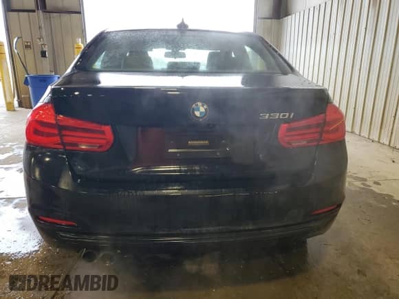 2018 BMW 3 Series 330i with VIN WBA8B9G55JNV11479, listed as a Copart auction lot 86147485 with 83,064 mi miles and Salvage title. Bid and sale history available at DreamBid. Image 6.