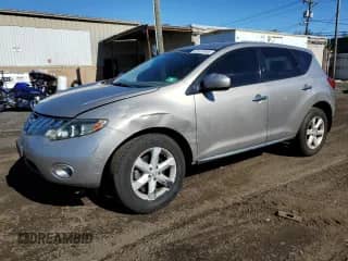 2010 Nissan Murano SL с VIN JN8AZ1MW5AW121222, выставлен на аукционе Copart как лот 87430985 с пробегом 98 071 миль миль и Списание • Salvage title. История ставок и продаж доступна на DreamBid. Изображение 1.