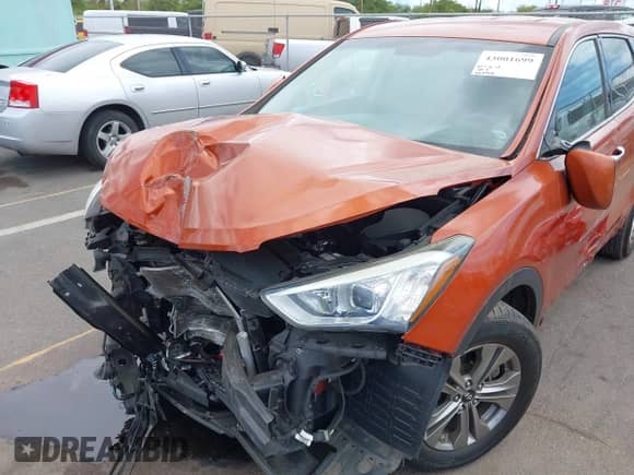 2016 Hyundai Santa Fe with VIN 5XYZT3LB4GG352189, listed as a IAAI auction lot 43001699 with 61,048 mi miles and . Bid and sale history available at DreamBid. Image 6.