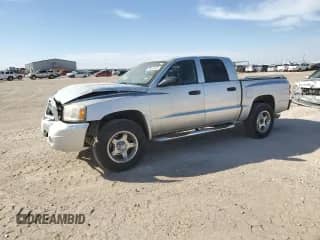 2007 Dodge Dakota SLT z VIN 1D7HE48N37S107379, wystawiony jako Copart lot #78156304 z przebiegiem 129 092 mil mil oraz Szkoda całkowita • Salvage title. Historia ofert i sprzedaży dostępna na DreamBid. Obrazek 1.