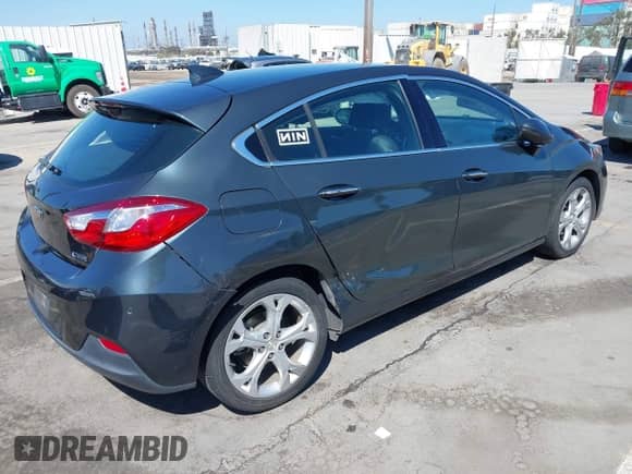 2018 Chevrolet Cruze Premier с VIN 3G1BF6SM0JS633188, выставлен на аукционе IAAI как лот 43178101 с пробегом 125 394 миль миль и . История ставок и продаж доступна на DreamBid. Изображение 4.