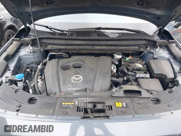 2022 Mazda CX-5 S Preferred z VIN JM3KFBCM9N0542679, wystawiony jako IAAI lot #42107215 z przebiegiem 57 018 mil mil oraz . Historia ofert i sprzedaży dostępna na DreamBid. Obrazek 10.