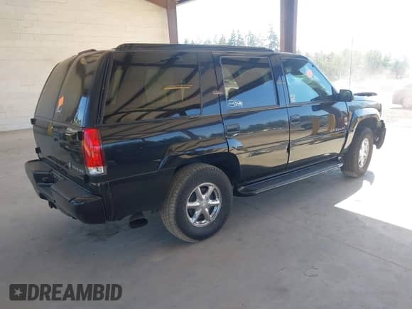 2000 Cadillac Escalade with VIN 1GYEK13R3YR113166, listed as a IAAI auction lot 42847629 with 156,127 mi miles and . Bid and sale history available at DreamBid. Image 4.