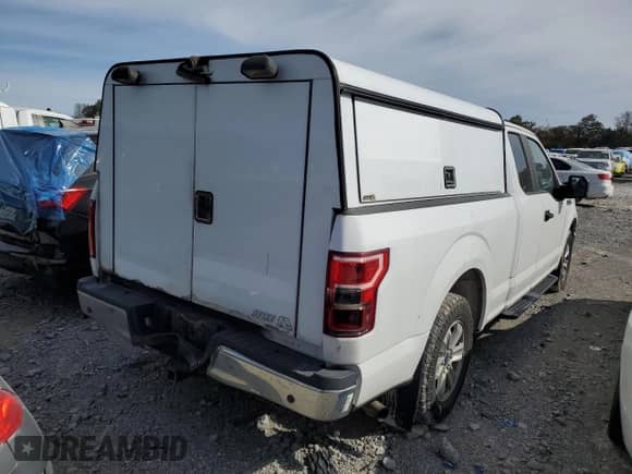 2019 Ford F-150 XL with VIN 1FTEX1CB4KKC61983, listed as a Copart auction lot 87250335 with 197,627 mi miles and Clean title. Bid and sale history available at DreamBid. Image 3.