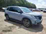 2022 Honda Passport Elite with VIN 5FNYF8H0XNB027168, listed as a Copart auction lot 66992495 with 46,446 mi miles and Salvage title. Bid and sale history available at DreamBid. Image 4.