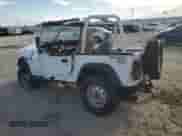 1993 Jeep Wrangler S с VIN 1J4FY19P7PP237637, выставлен на аукционе Copart как лот 70802755 с пробегом 127 470 миль миль и Списание • Salvage title. История ставок и продаж доступна на DreamBid. Изображение 2.