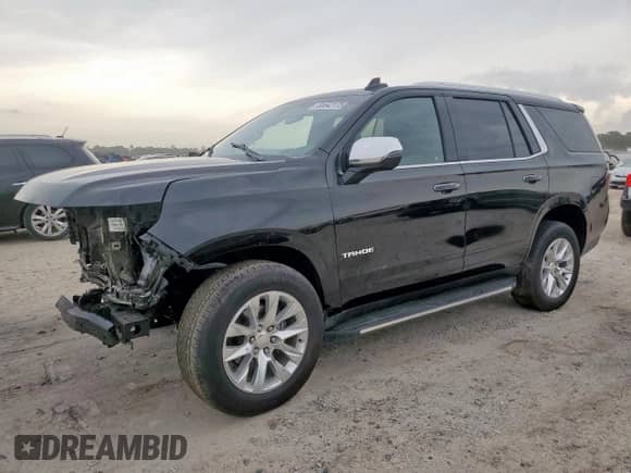 2023 Chevrolet Tahoe Premier z VIN 1GNSCSKD6PR520373, wystawiony jako Copart lot #60642175 z przebiegiem Nie podano mil oraz Szkoda całkowita • Salvage title. Historia ofert i sprzedaży dostępna na DreamBid. Obrazek 1.