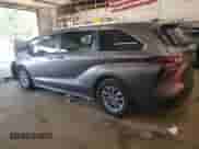 2021 Toyota Sienna LE with VIN 5TDKSKFC9MS015521, listed as a Copart auction lot 80913925 with 124,556 mi miles and Salvage title. Bid and sale history available at DreamBid. Image 2.