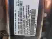 2021 Honda Pilot Touring 8-Passenger z VIN 5FNYF6H94MB034392, wystawiony jako Copart lot #68621825 z przebiegiem Nie podano mil oraz Nie do naprawy • Non repairable. Historia ofert i sprzedaży dostępna na DreamBid. Obrazek 13.