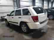 2006 Jeep Grand Cherokee Laredo with VIN 1J4GR48K76C255988, listed as a Copart auction lot 68521495 with 171,036 mi miles and Salvage title. Bid and sale history available at DreamBid. Image 2.